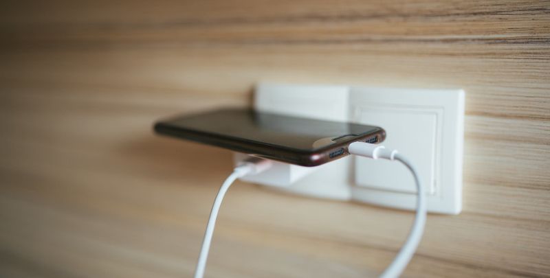 Power point with adaptor for phone charging.